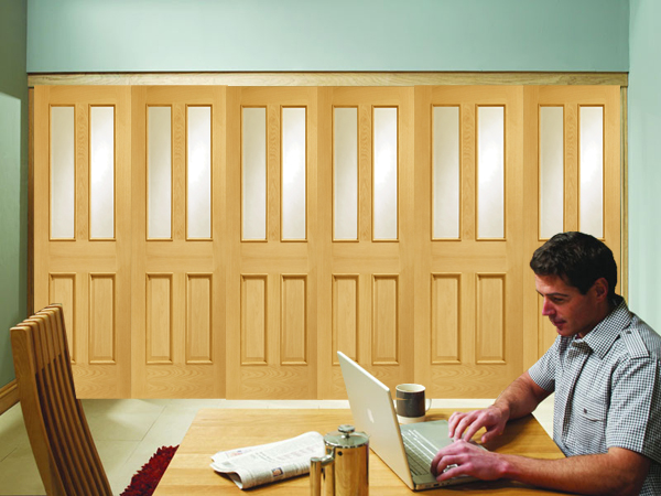 Freefold Malton Raised Mouldings (clear bevelled glass) Oak Internal Folding Sliding Doors